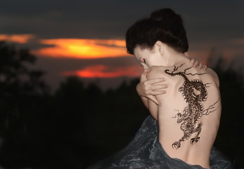 Geisha with dragon tattoo