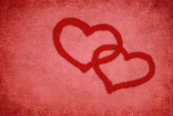 Red hearts on red handmade paper