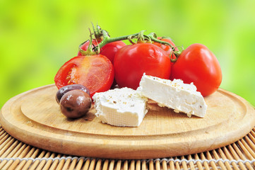 Fresh tomatoes, olives and white cheese