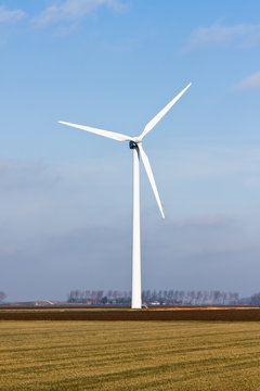 Windturbine in the farmland of Flevoland, the Netherlands