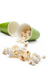 Popcorn in a green paper cup