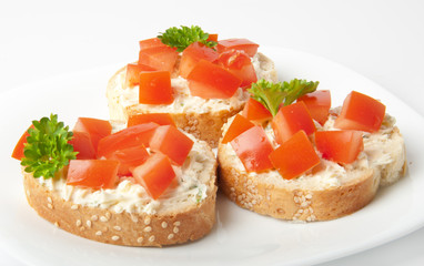 Appetizers with tomatoes and cream cheese