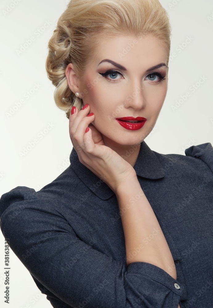 Wall mural retro woman in grey dress.