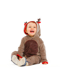 Portrait of lovely baby dressed as Santa Claus's reindeer
