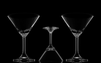 Two Sharp Cocktail glasses and one blur