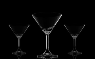 Three Cocktail glasses on black