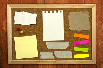 Blank memo notes on cork board