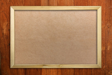 Wood picture frame on wood panel