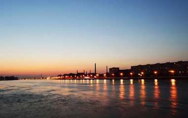 October embankment and Neva river after sunset