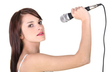 young girl holding microphone