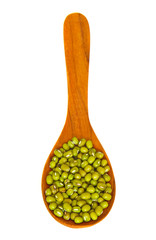 mung beans over wooden spoon isolated on white
