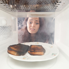Burned toasts and shocked girl