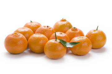 group of clementine oranges isolated on a white background