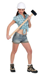 Portrait of sexy woman with hammer