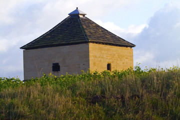 Fototapeta premium A farm storage shed in a field