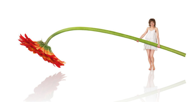 Beautiful young woman with a flower