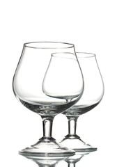 Two empty glasses isolated on white