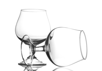 Two empty glasses isolated on white