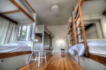 Bunk Beds in a Hostel - obrazy, fototapety, plakaty