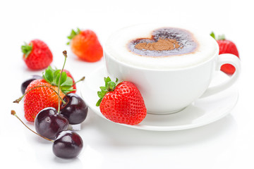 cappuccino in a cup in the shape of hearts,cherry and strawberri