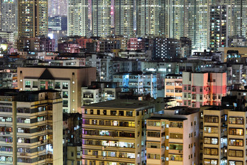 Fototapeta na wymiar crowded building at night in Hong Kong