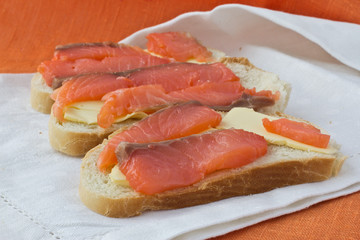 3 sandwiches with salmon