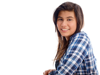 smiling teenage girl sitting in the classroom