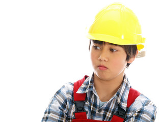 boy wearing construction helmet