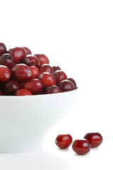 fresh cranberries in a white bowl