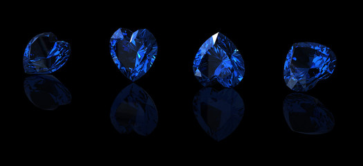Blue sapphire shape of heart on black background.