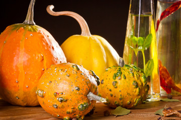 Fresh vegetables and fresh spices in the bottle of oil