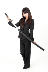 asian businesswoman with japanese sword