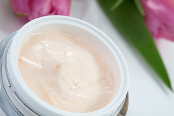 Face cream and tulips