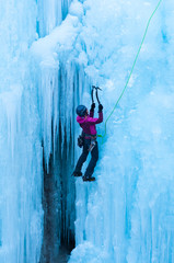 portrait of woman climbing ice