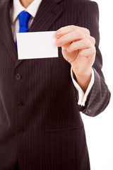 Business man offering card, isolated over white background