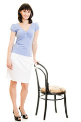 A woman in a blue shirt and white skirt on a white background.