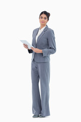 Obraz na płótnie Canvas Saleswoman with tablet computer