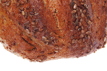 loaf of french rye bread topped with sunflower