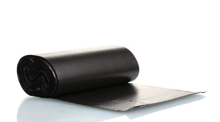 Roll of black garbage bags isolated on white