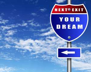 Road sign agaisnt blue sky