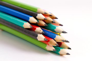 Colour pencils isolated on white background close up