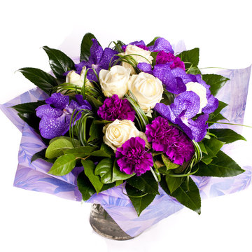 bunch of violet flowrs in vase