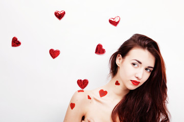 Brunette girl with red hearts