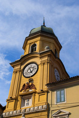 Fototapeta na wymiar yellow clock tower in rijeka, croatia
