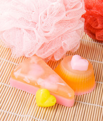 Fototapeta na wymiar soap with shower pouf washcloths