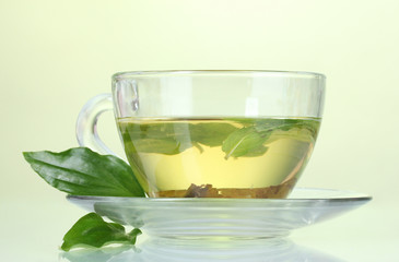 green tea in transparent cup with lime