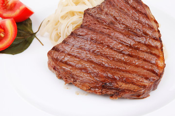 italian cuisine : grilled beef steak with pasta