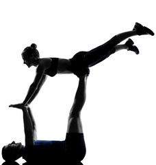 Obraz na płótnie Canvas couple woman man exercising workout