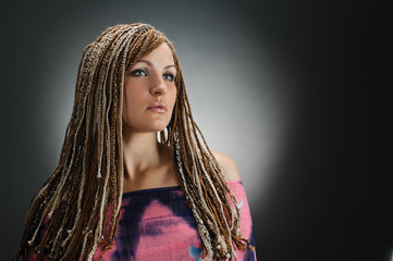 girl with an african plaits