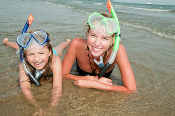 Summer vacation - snorkel girls at the beach